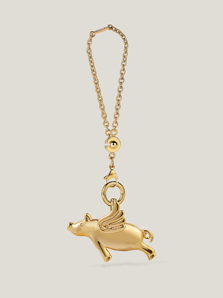 Luxury Brass Fliggy Bag Charm  - Luxury Bags Hermes Birkin recension och pris