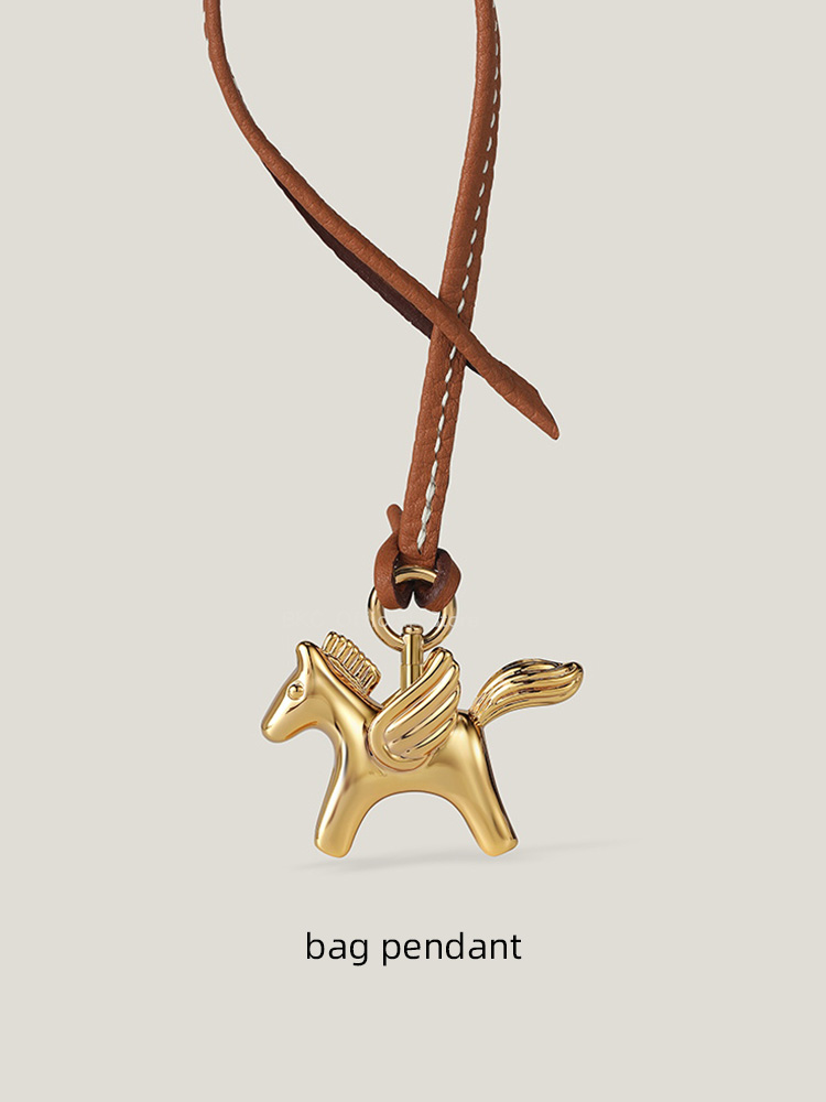 Luxury Brass Pegasus Bag Charm - Luxury Bags Hermes Birkin recension och pris